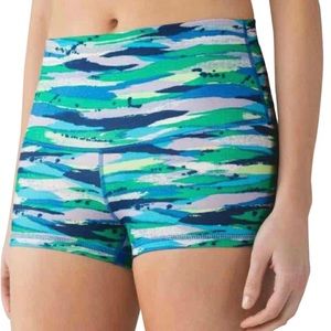 Green and white lulu lemon boogie shorts.